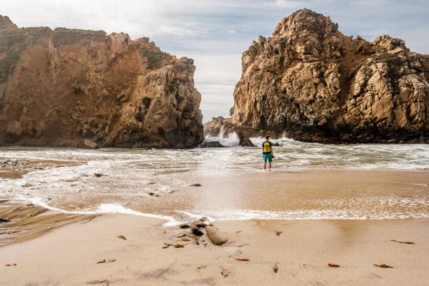 istock Man at Pfeiffer Beach, California 675272200