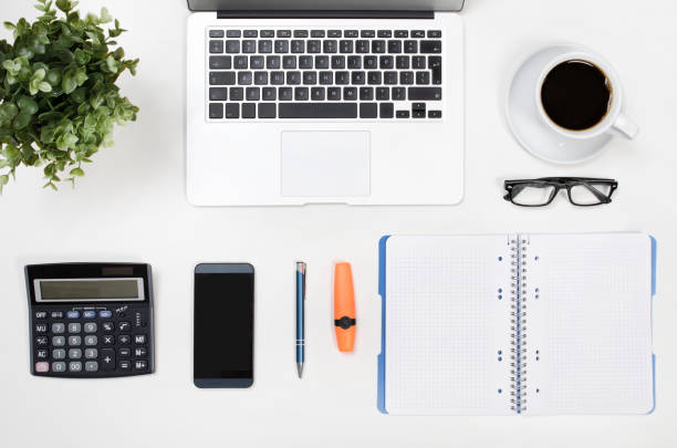 Business white desk in office top view Business white desk in office top view. office supply order arrangement background banner blank business concept neat office stock pictures, royalty-free photos & images