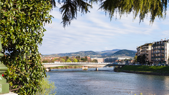 travel to Italy - view of Ponte Risorgimento of Adige river in Verona city in spring