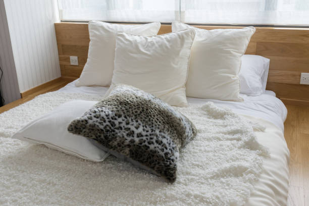 istock stylish bedroom interior design with black and white pillows on bed. 675286772
