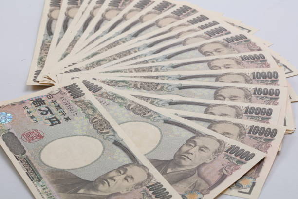 banknoten von der japanischen yen- 10.000 yen - japanischer yenschein stock-fotos und bilder