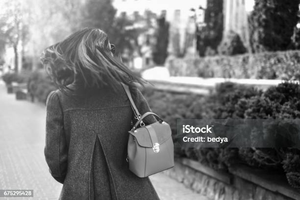 Long Hair Brunette Girl Outdoor Stock Photo - Download Image Now - Adult, Arts Culture and Entertainment, Backpack