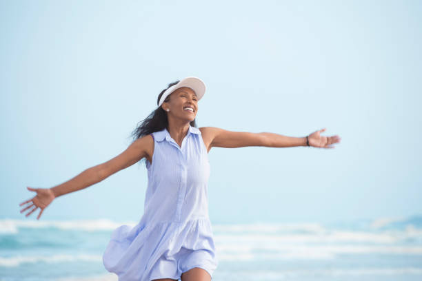 istock Summer freedom woman on sea. 675298008