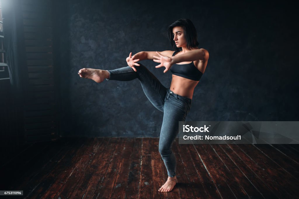 Grace female dancer, contemp dance Grace female dancer, contemp dance. Gymnastic exercise in ballroom Active Lifestyle Stock Photo