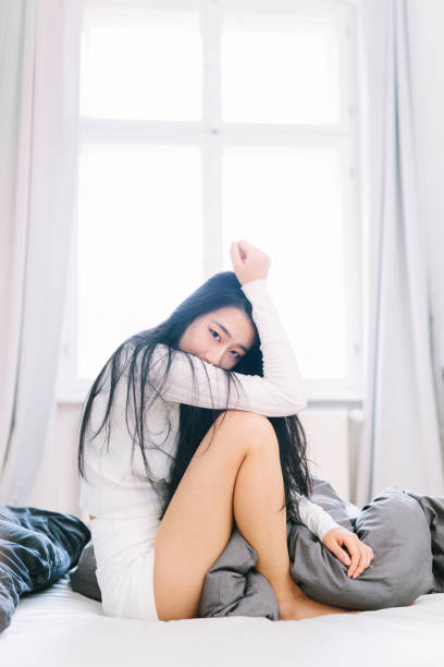 istock Asian Woman Waking Up 675315058