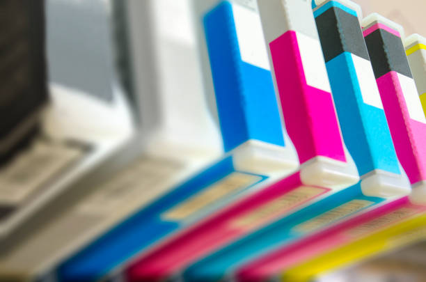 istock Inkjet printer. Close up on CMYK cartridge. Shallow DOF 675324286