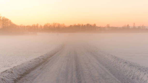 istock empty road in the countryside in winter 675324652