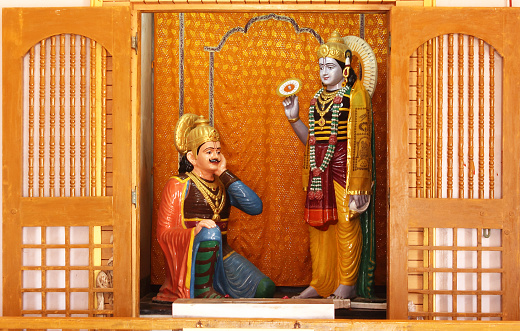 Krishna predicaba a Arjuna en el famoso antiguo campo de batalla de Kurukshetra photo