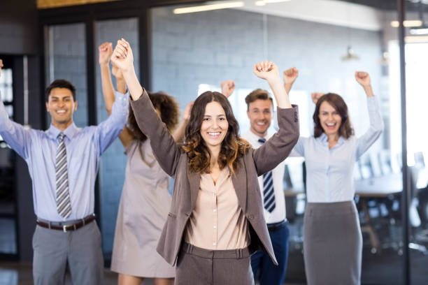 istock Successful business team celebrating their victory 675328320