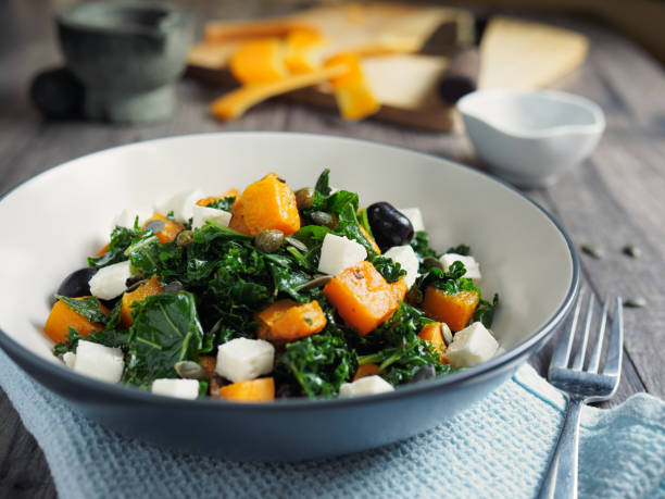 istock roasted butternut squash with kale and feta cheese 675337384