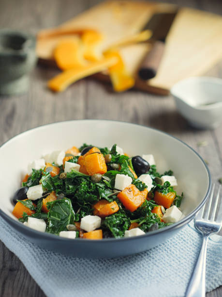 istock roasted butternut squash with kale and feta cheese 675337812