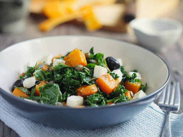 istock roasted butternut squash with kale and feta cheese 675337818