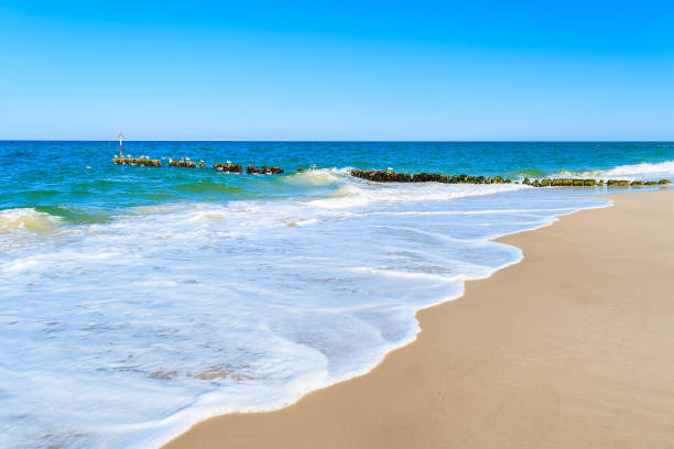 istock Sea waves on a beach, Sylt island, Germany 675341216