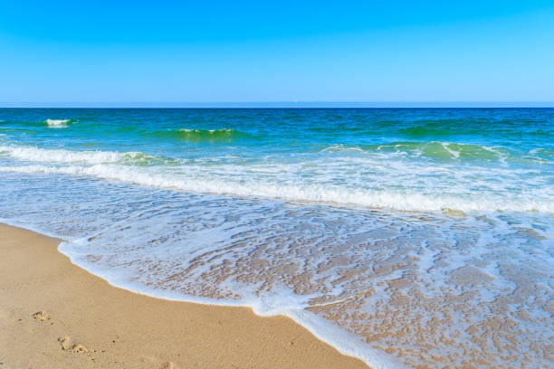 istock Sea waves on a beach, Sylt island, Germany 675341222