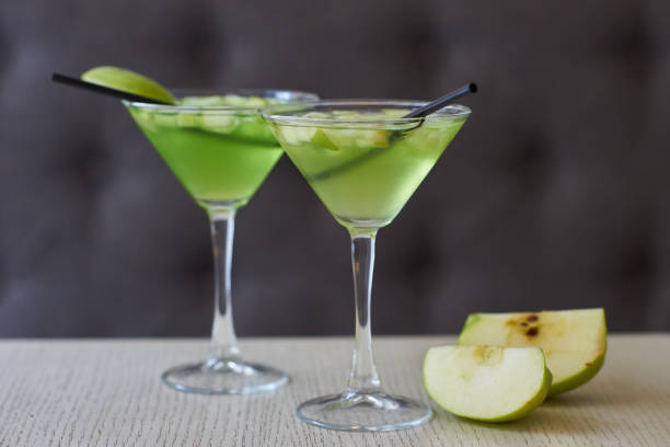istock Two glasses of apple martini 675344840