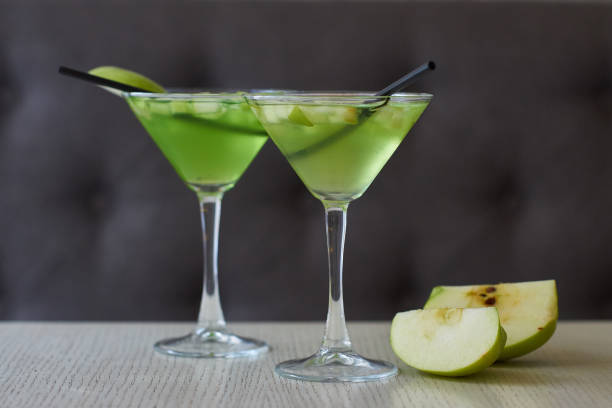 istock Two glasses of apple martini 675347188