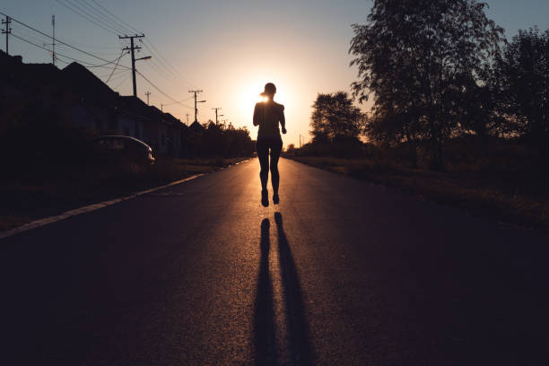 istock Fit young woman running 675347684