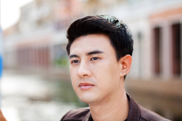istock Portrait of young thai man 675351242
