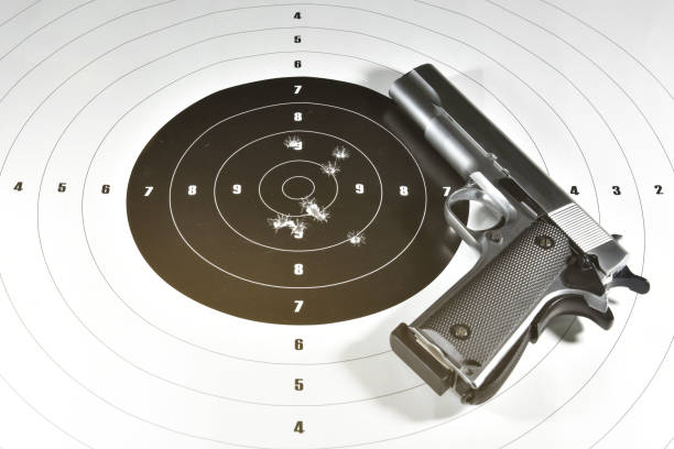 1911 semi automatic handgun and shooting target