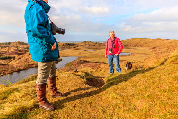 istock Senior man on countryside walk 675361732
