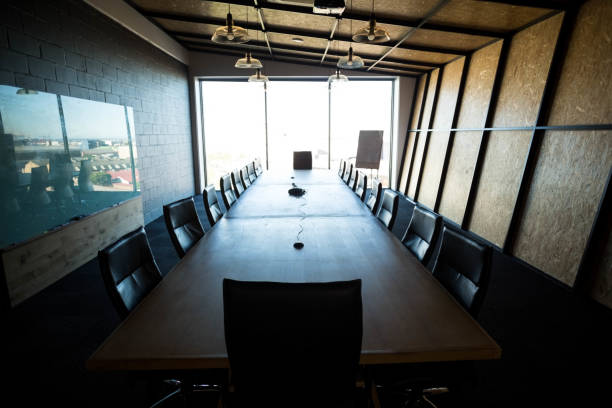 istock An empty modern conference room and conference table in office 675368516