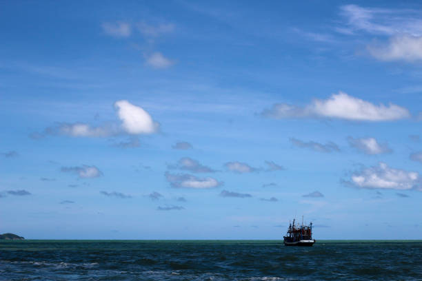 istock A boat on a vast ocean 675382420