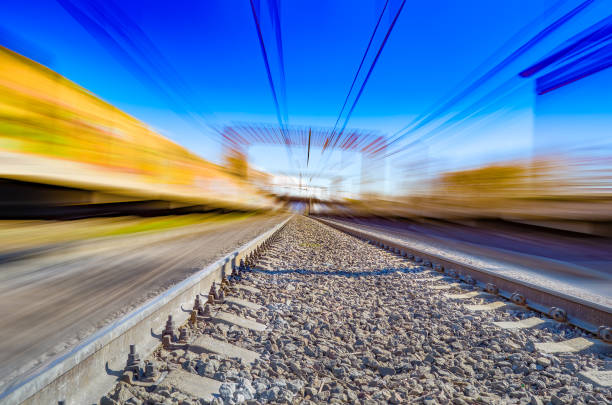 istock Railroad in motion. Railway station with motion blur effect 675382902