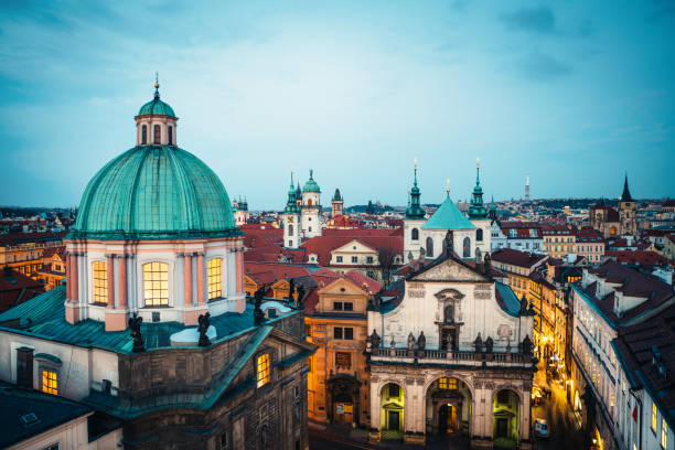 Prague Towers Cityscape of Prague with Old Town (Stare mesto) and its numerous towers: Church of St. Francis of Assisi, Clementinum, St. Savior, Astronomical clock tower etc. bohemia pics stock pictures, royalty-free photos & images