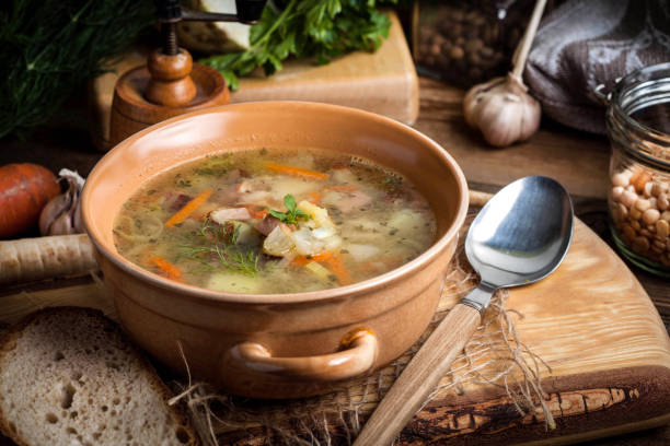 istock Pea soup with vegetables and bacon. 675389264