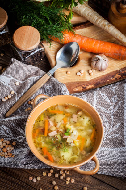 istock Pea soup with vegetables and bacon. 675389414