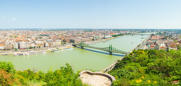 BUDAPEST, HUNGARY - JUNE 15, 2016: Dunabe river with famous Liberty or Freedom Bridge connecting Buda and Pest in Budapest, Hungary - June 15, 2016
