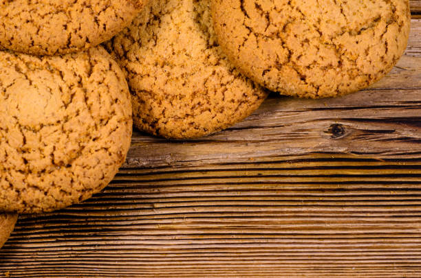 istock Stack of the oatmeal cookies on wooden table 675392470