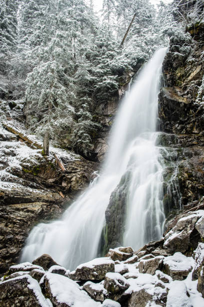 istock Waterfall from ravine in winter, long exposure 675395956