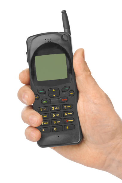 istock Hand with retro mobile phone 675409046