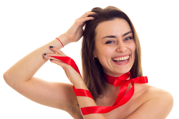 istock Young woman with red bowtie 675419930