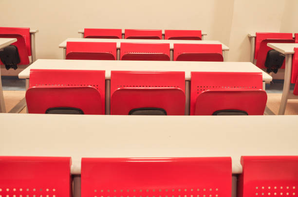 Classroom Red classroom seats empty desk in classroom stock pictures, royalty-free photos & images