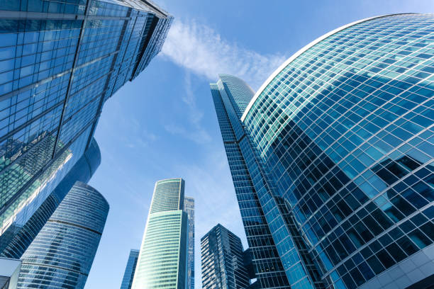 istock Business office buildings under clear blue sky 675426308