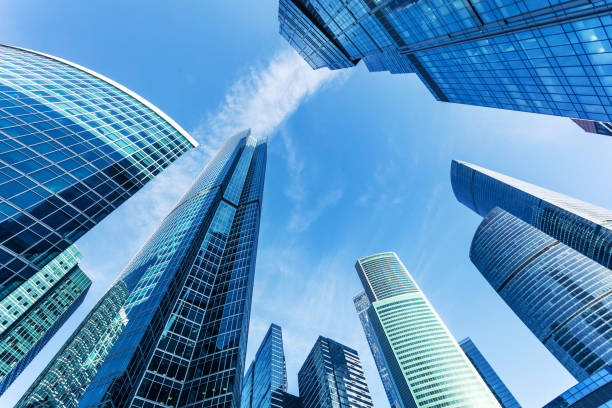 istock Business office buildings under clear blue sky 675426342