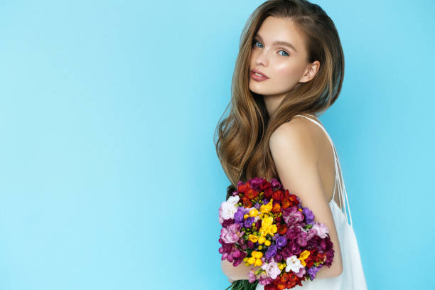 Beautiful woman with flowers