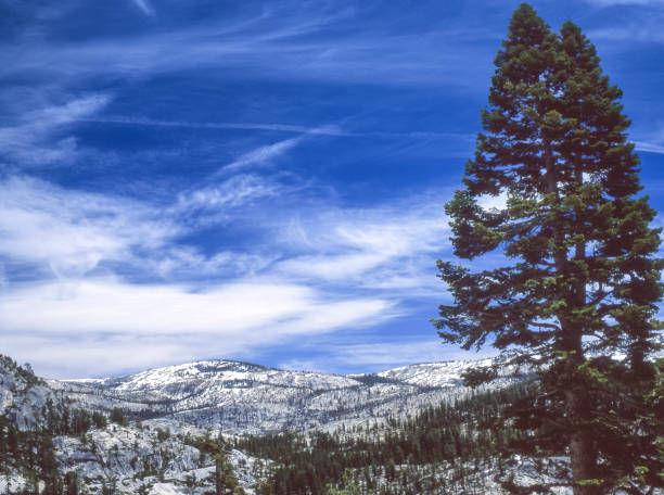 istock Snow Covered Sierra Nevada View with Clouds 675436212