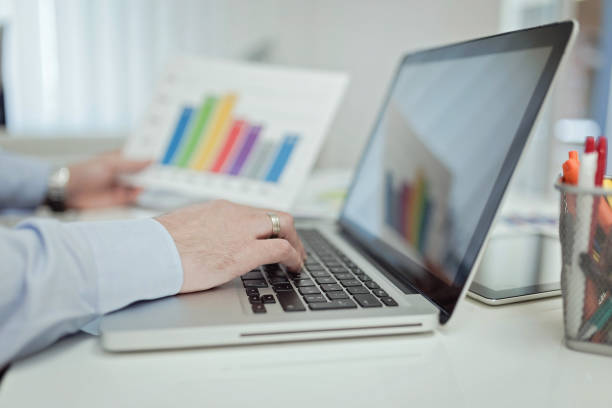 istock Businessman working on a laptop 675436346