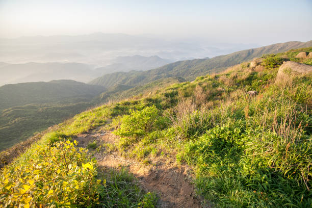 istock Sunrise over the moutain with small lane 675439452