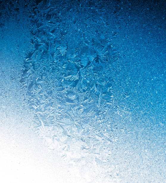 istock blue frosty winter background 675443070