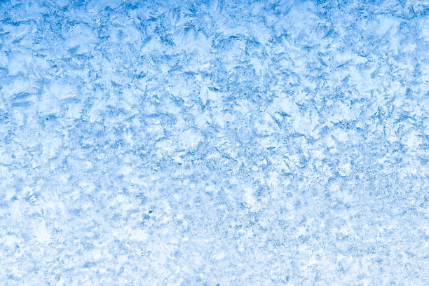 istock blue frosty winter background 675443162