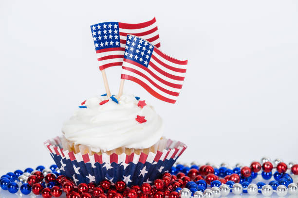 istock Patriotic cupcake with American flags 675445494
