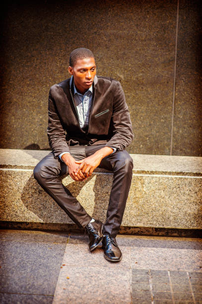 istock Young African American Man thinking outside in New York 675449012