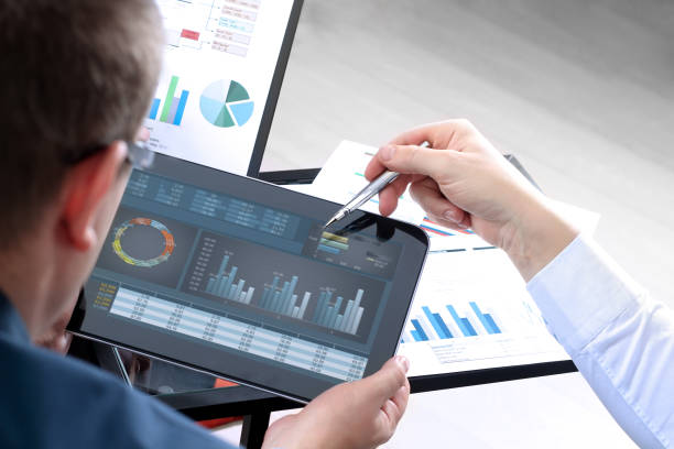 istock Business colleagues working and analyzing financial figures on a graphs 675451374