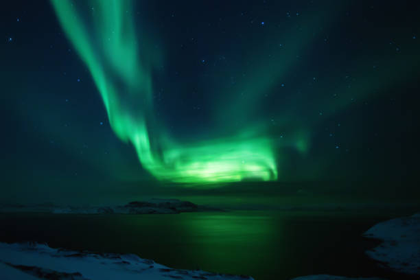 istock Northern lights. Aurora borealis nature landscape at night 675452152