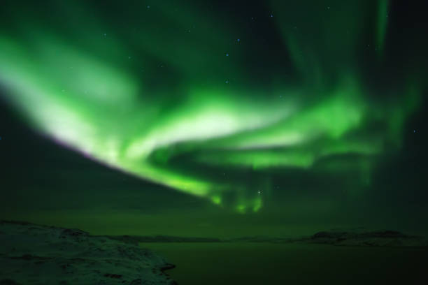 istock Northern lights. Aurora borealis nature landscape at night 675452272