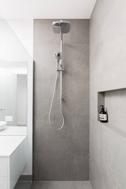 Luxury fully tiled shower with rain head shower rose
